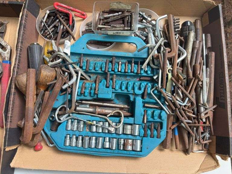 Flat of drill bits and Allen wrenches