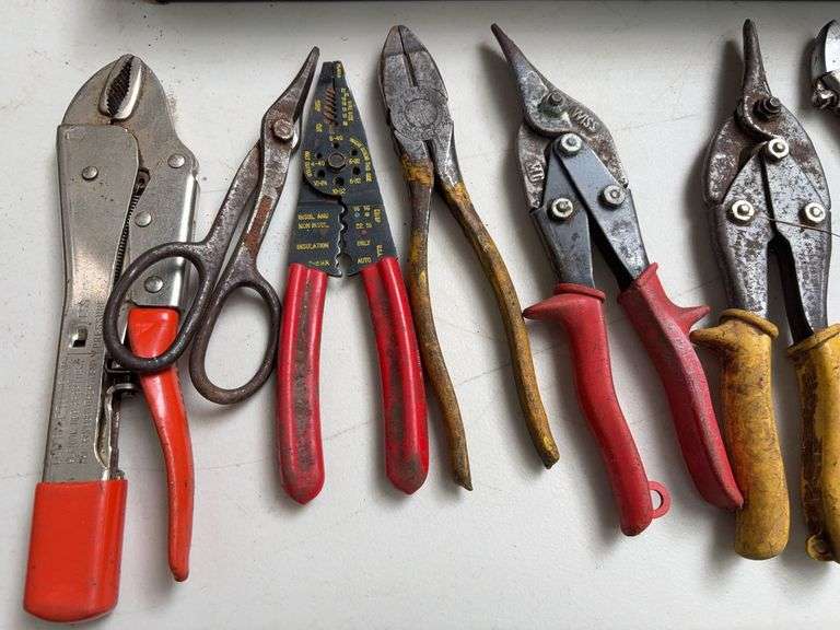Flat of wrenches, pliers, snips, and other hand tools