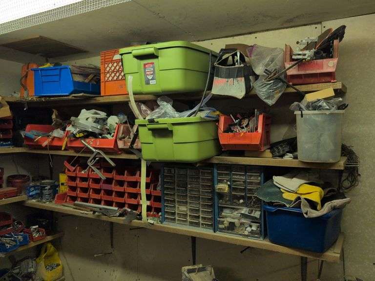 (3) shelves of contents - hardware, work gloves, automatic level, caulk guns, and more
