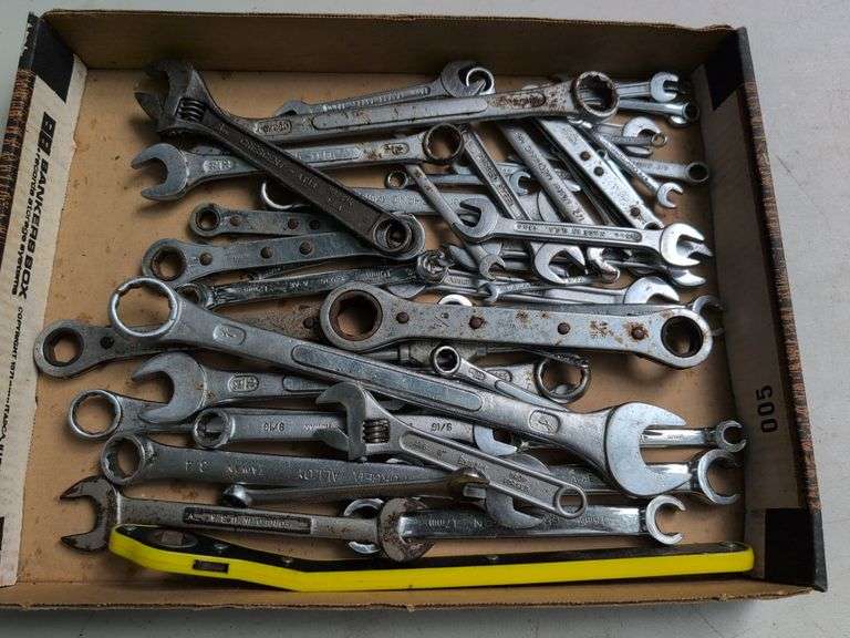 Flat of wrenches and adjustable wrenches