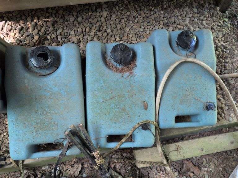 (3) portable waste water tanks, (2) water tanks, and 1.8 ton car jack