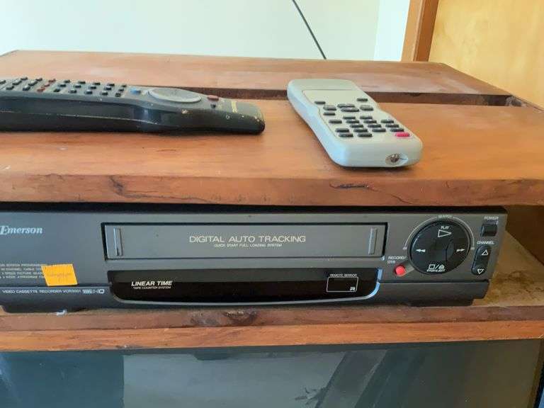 Panasonic 27” Colored Television, Emerson Video Cassette Player, Mounting Box
