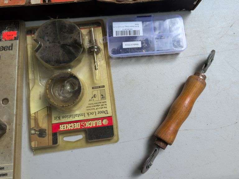 Glue gun, drill bits, clamp, and other tools
