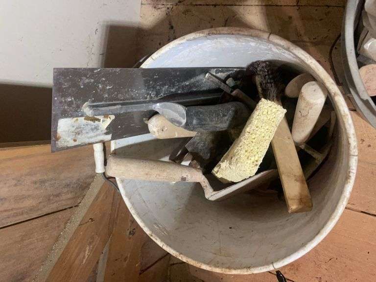 (2) buckets of cementing and masonry items