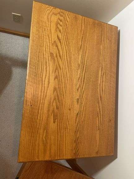 Wooden office desk, rolling chair, and stand