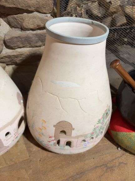 Decorative clay jugs and figurines