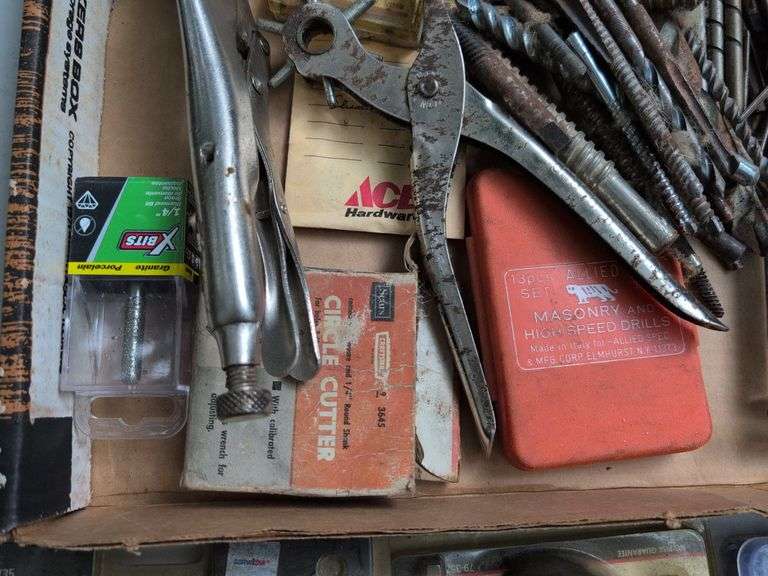 Glue gun, drill bits, clamp, and other tools