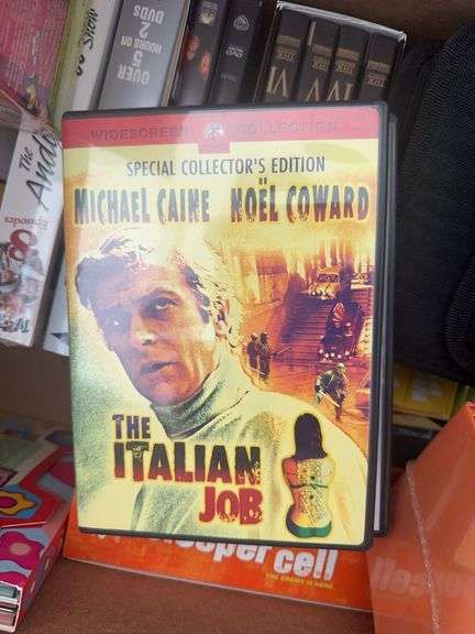 Box of VCR Tapes and DVDs