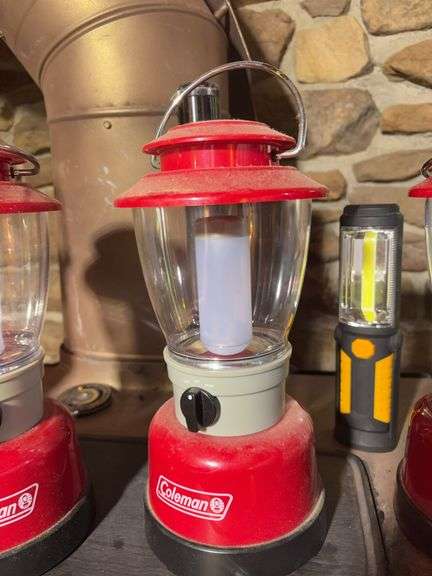 (3) matching Coleman lanterns, Dorcy lantern, and (2) flashlights