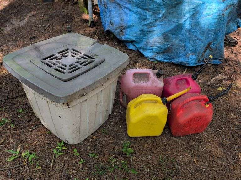 (4) gas cans and large water tank