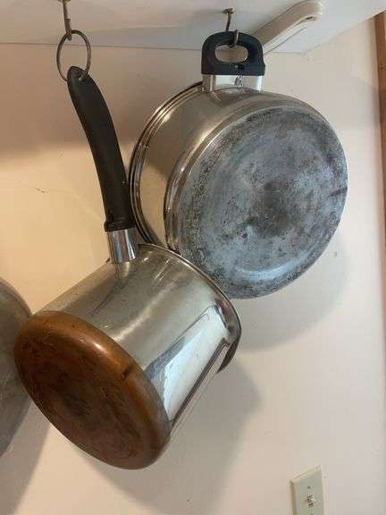 Lot of pots and pans including Farberware and revereware