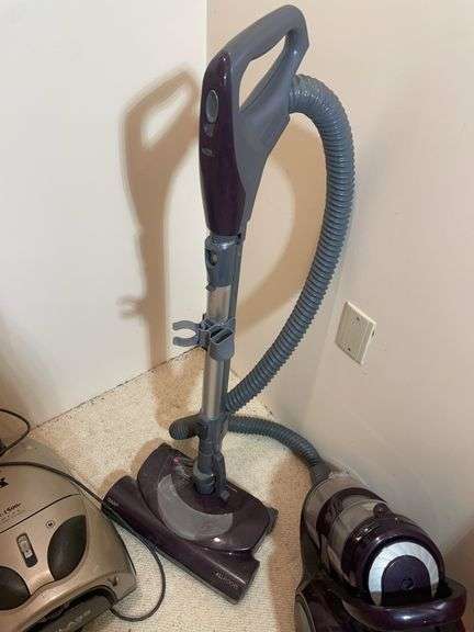 (2) vacuums with movable collectors