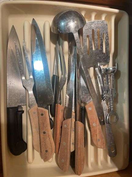 Cooking utensils, dumbbells, and other items