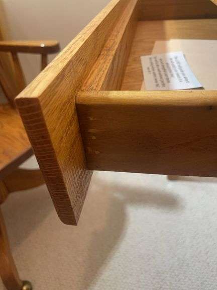 Wooden office desk, rolling chair, and stand
