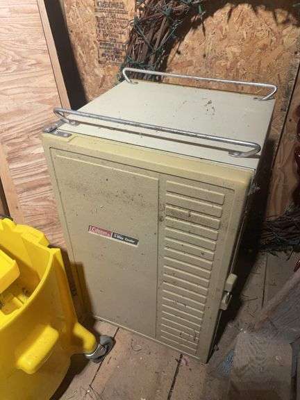 Small step ladder, mop bucket, and Coleman 3-way cooler