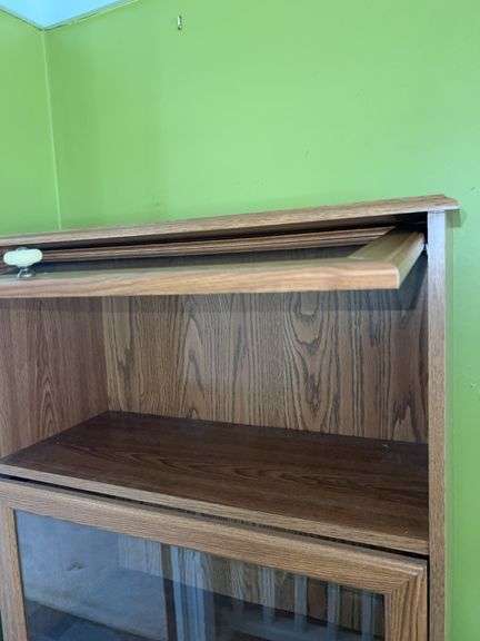 Unmarked Wooden Bookcase with Glass Doors