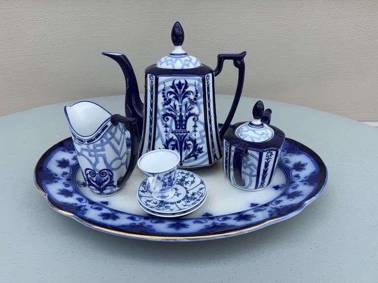Blue and White Patterned Tea Pot w/ Sugar and Creamer, (2) Tea Cups w/ (2) Plates, and Serving Dish