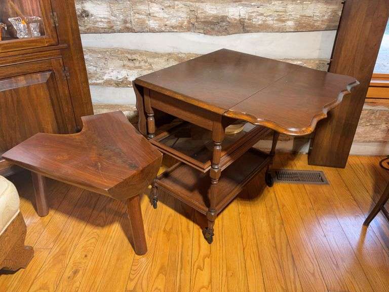 Wooden drop leaf stand with wheels and log bench