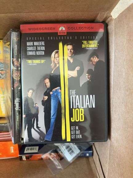 Box of VCR Tapes and DVDs