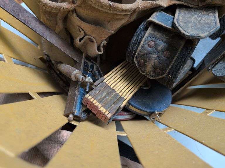 (2) tool belts with tools, extension cords, and other items