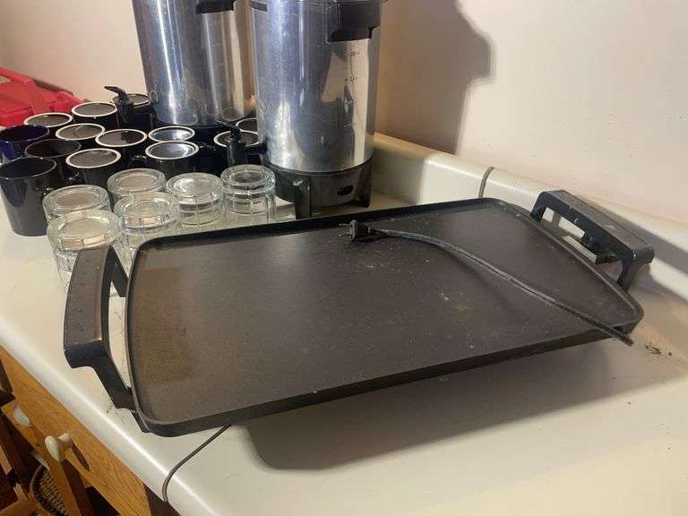 Griddle, mugs, (2) coffee warmers, and drinking glasses