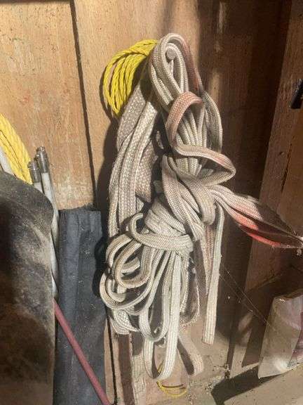 Contents of corner including buckets, roping, scrap wood and more