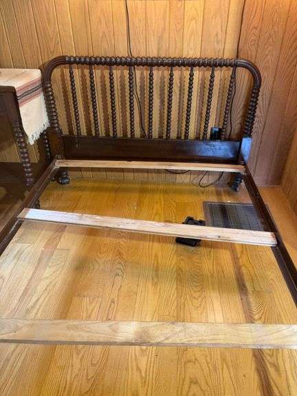 Twin bed frame with matching nightstand and comforter