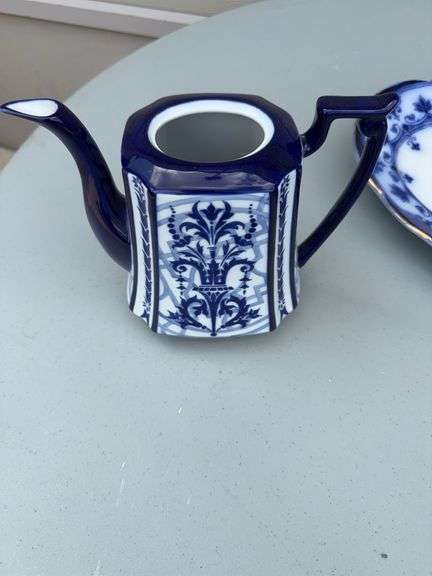 Blue and White Patterned Tea Pot w/ Sugar and Creamer, (2) Tea Cups w/ (2) Plates, and Serving Dish