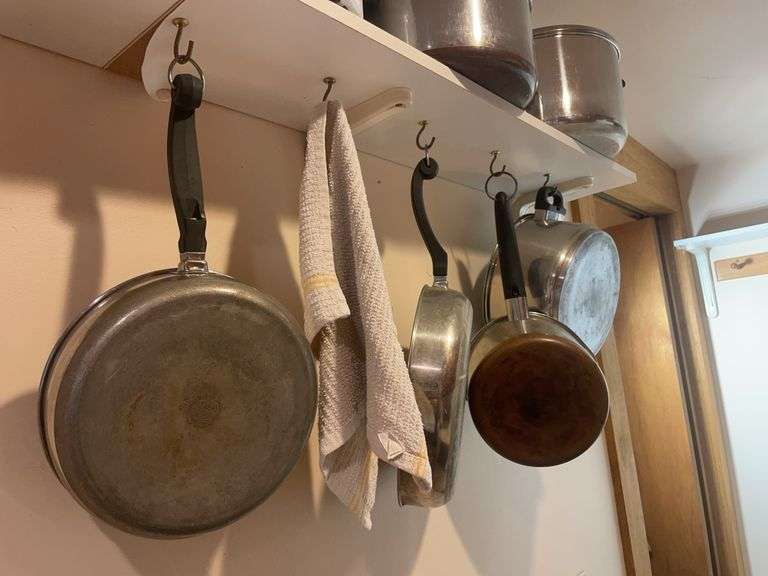 Lot of pots and pans including Farberware and revereware