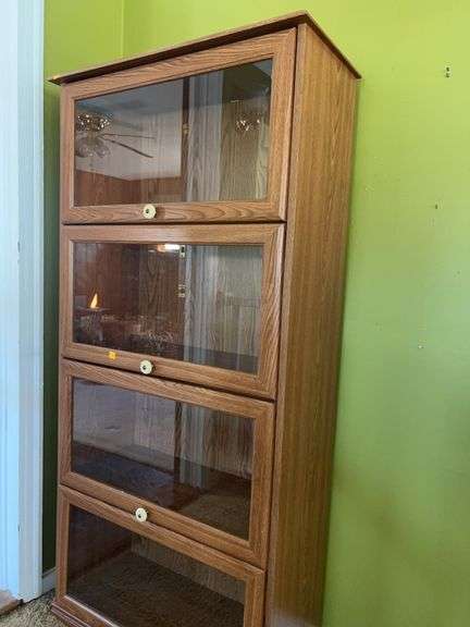 Unmarked Wooden Bookcase with Glass Doors