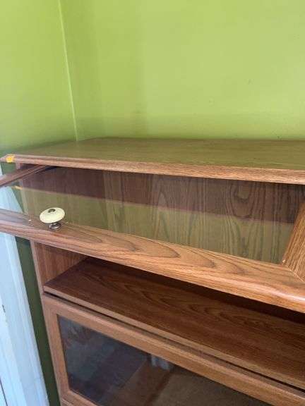 Unmarked Wooden Bookcase with Glass Doors