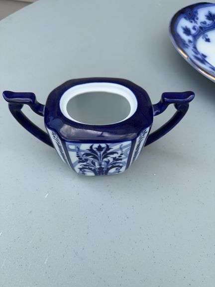 Blue and White Patterned Tea Pot w/ Sugar and Creamer, (2) Tea Cups w/ (2) Plates, and Serving Dish