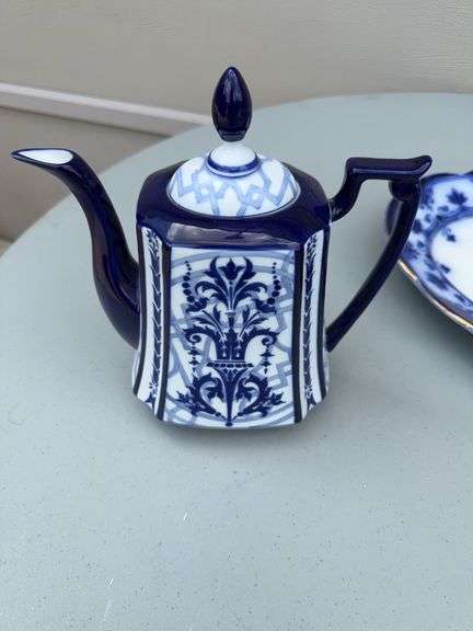 Blue and White Patterned Tea Pot w/ Sugar and Creamer, (2) Tea Cups w/ (2) Plates, and Serving Dish