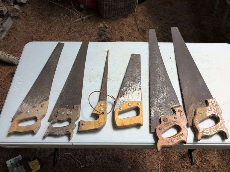 (6) hand saws - some antique with designs