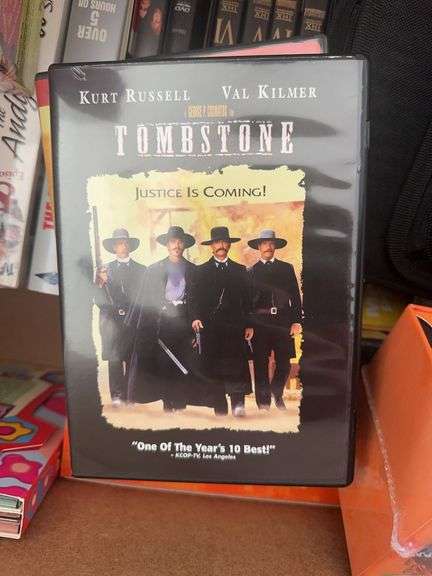 Box of VCR Tapes and DVDs