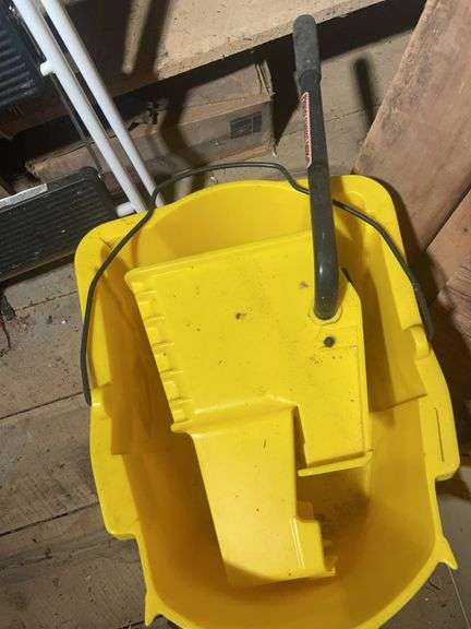 Small step ladder, mop bucket, and Coleman 3-way cooler