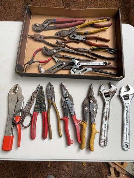 Flat of wrenches, pliers, snips, and other hand tools