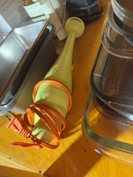 (2) shelves of stainless steel mixing bowls, cake pans, cupcake pan, loaf pans, and more