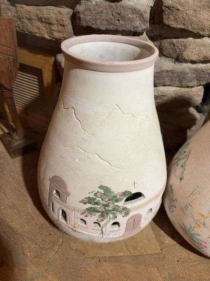 Decorative clay jugs and figurines