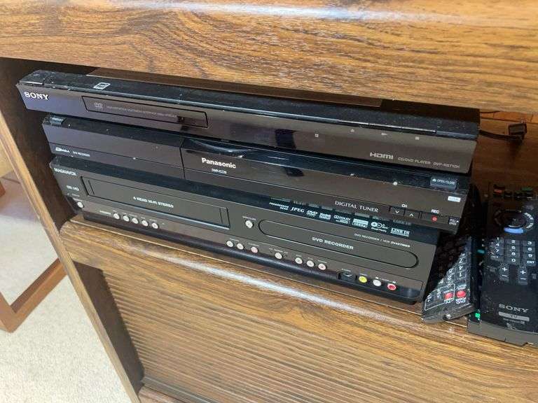 Wooden rolling stand with 40" Sony TV and DVD player and recorder