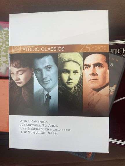 Box of VCR Tapes and DVDs