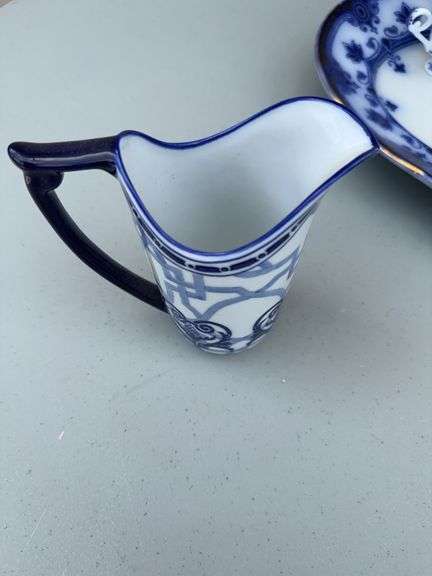 Blue and White Patterned Tea Pot w/ Sugar and Creamer, (2) Tea Cups w/ (2) Plates, and Serving Dish