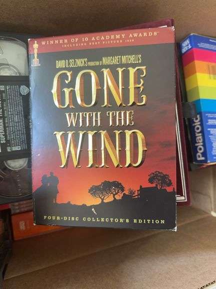 Box of VCR Tapes and DVDs