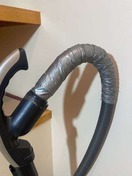 (2) vacuums with movable collectors