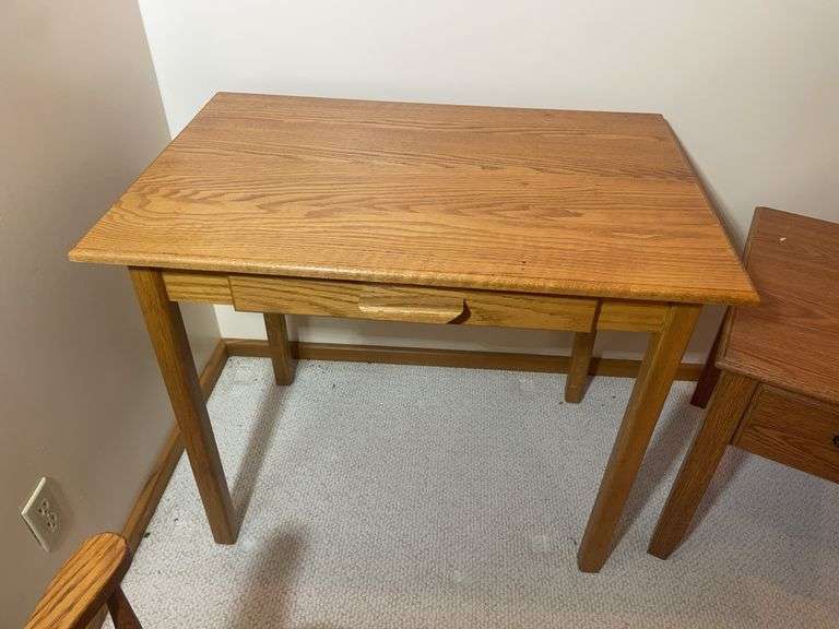 Wooden office desk, rolling chair, and stand