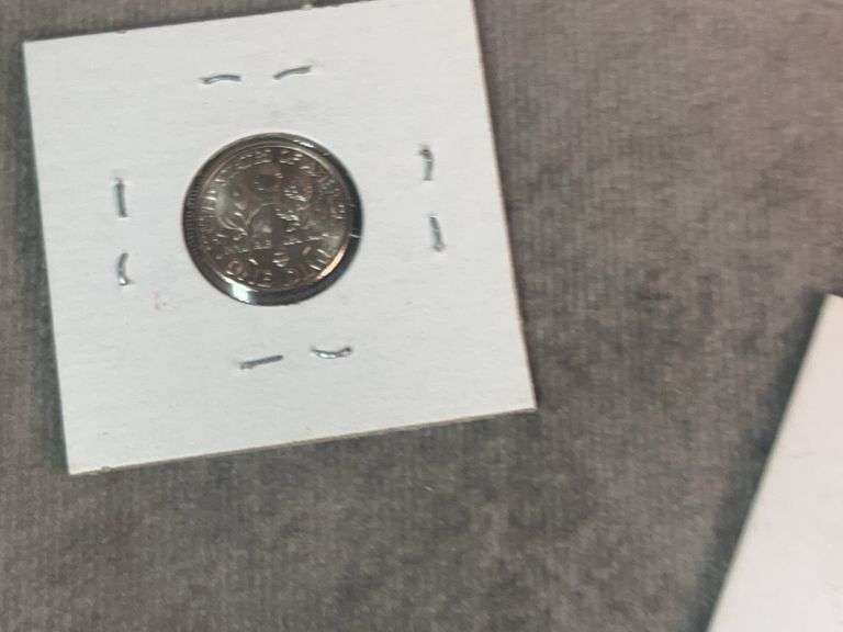 Four Roosevelt Dimes