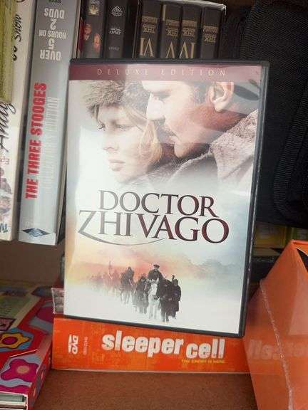 Box of VCR Tapes and DVDs