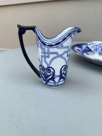 Blue and White Patterned Tea Pot w/ Sugar and Creamer, (2) Tea Cups w/ (2) Plates, and Serving Dish