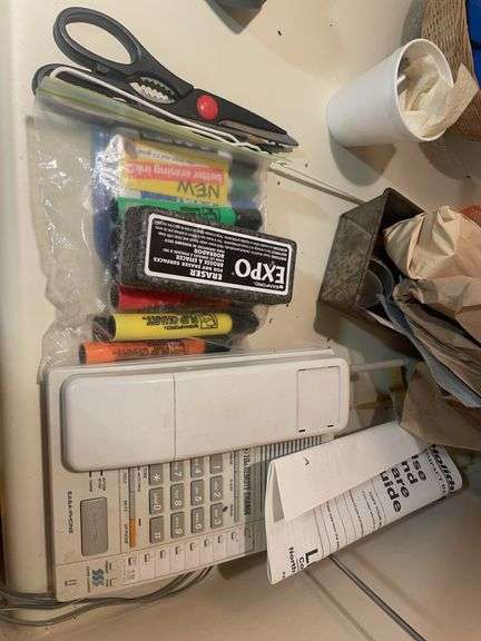 Cooking utensils, dumbbells, and other items