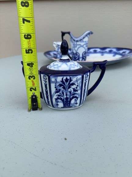 Blue and White Patterned Tea Pot w/ Sugar and Creamer, (2) Tea Cups w/ (2) Plates, and Serving Dish